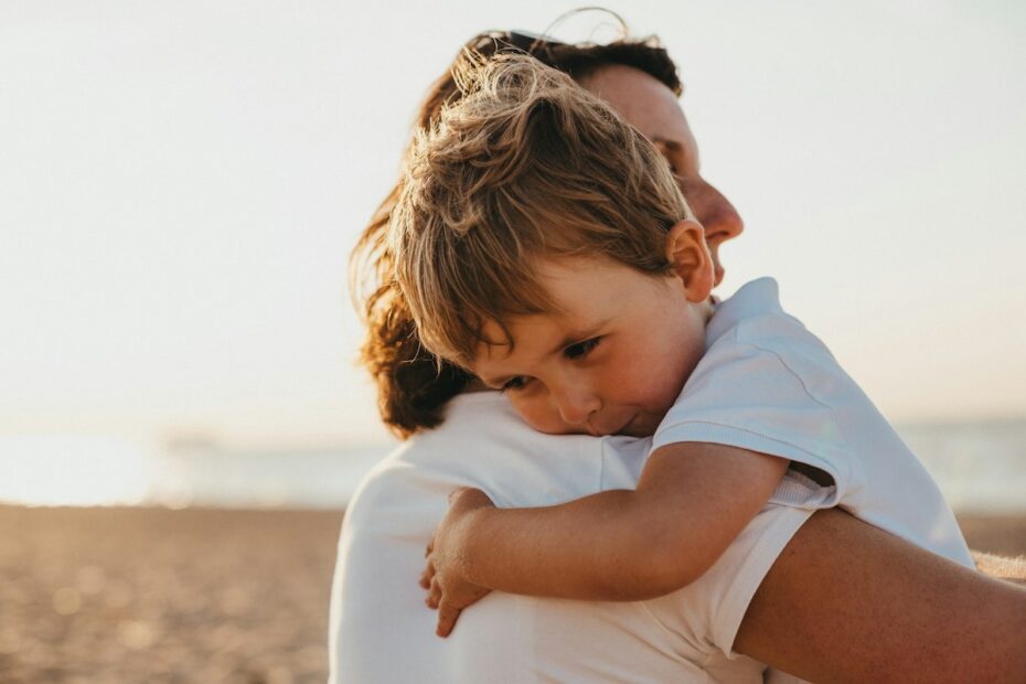 Mother hugging her young son, representing how Virginia courts decide custody between parents